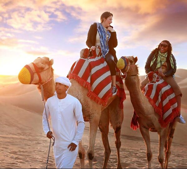 camel ride red dunes